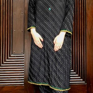2 piece black grip fabric outfit with golden tari lines, short shirt and embroidered trouser – available in small size only at Amqara